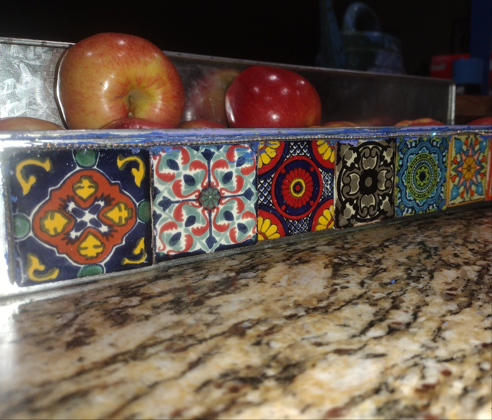 Metal tray w crystal grout. Talavera two inch tiles from Baja Mexico line the front