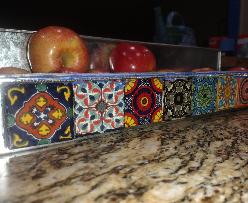 Metal tray w crystal grout. Talavera two inch tiles from Baja Mexico line the front